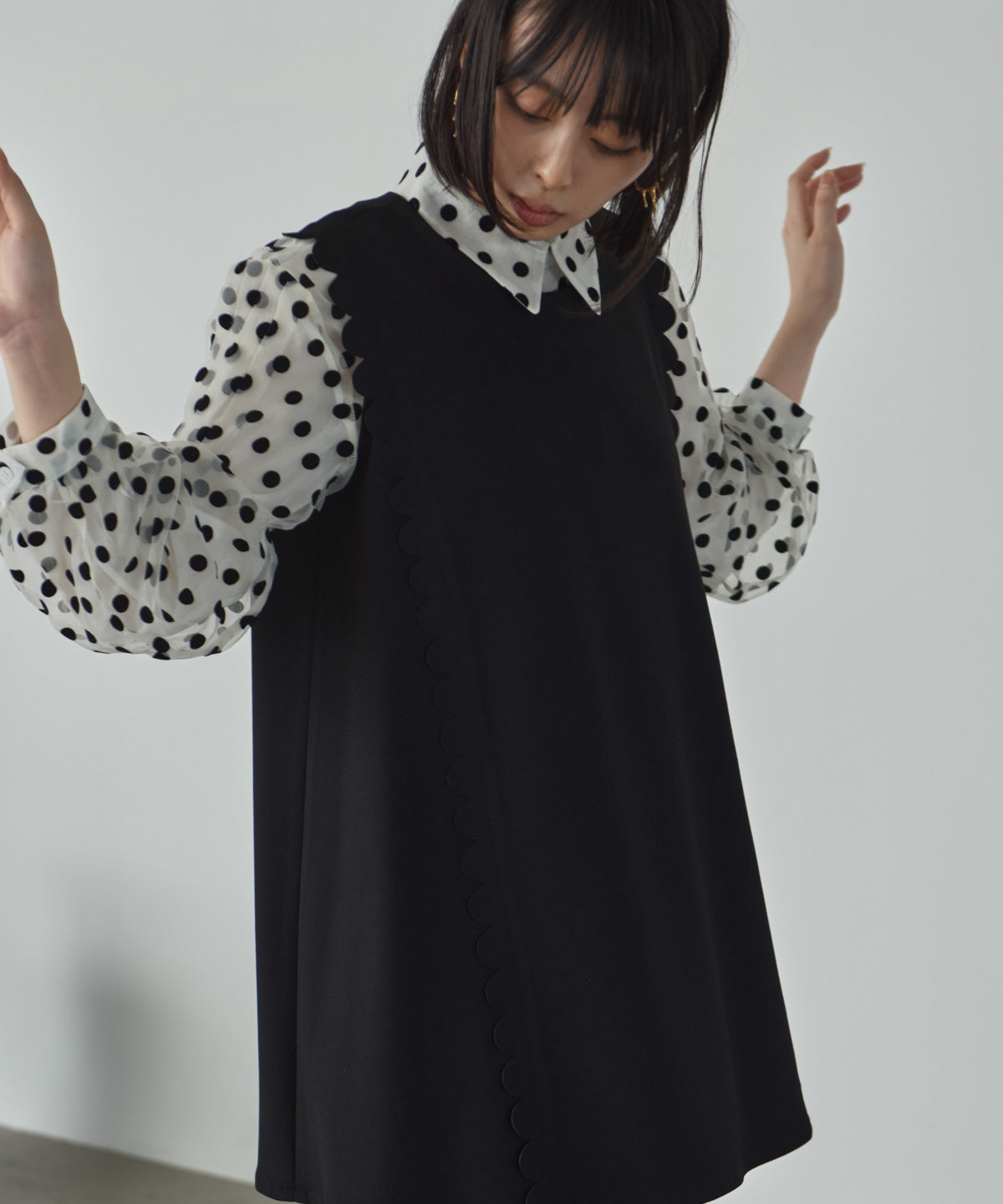 side scalloped vest