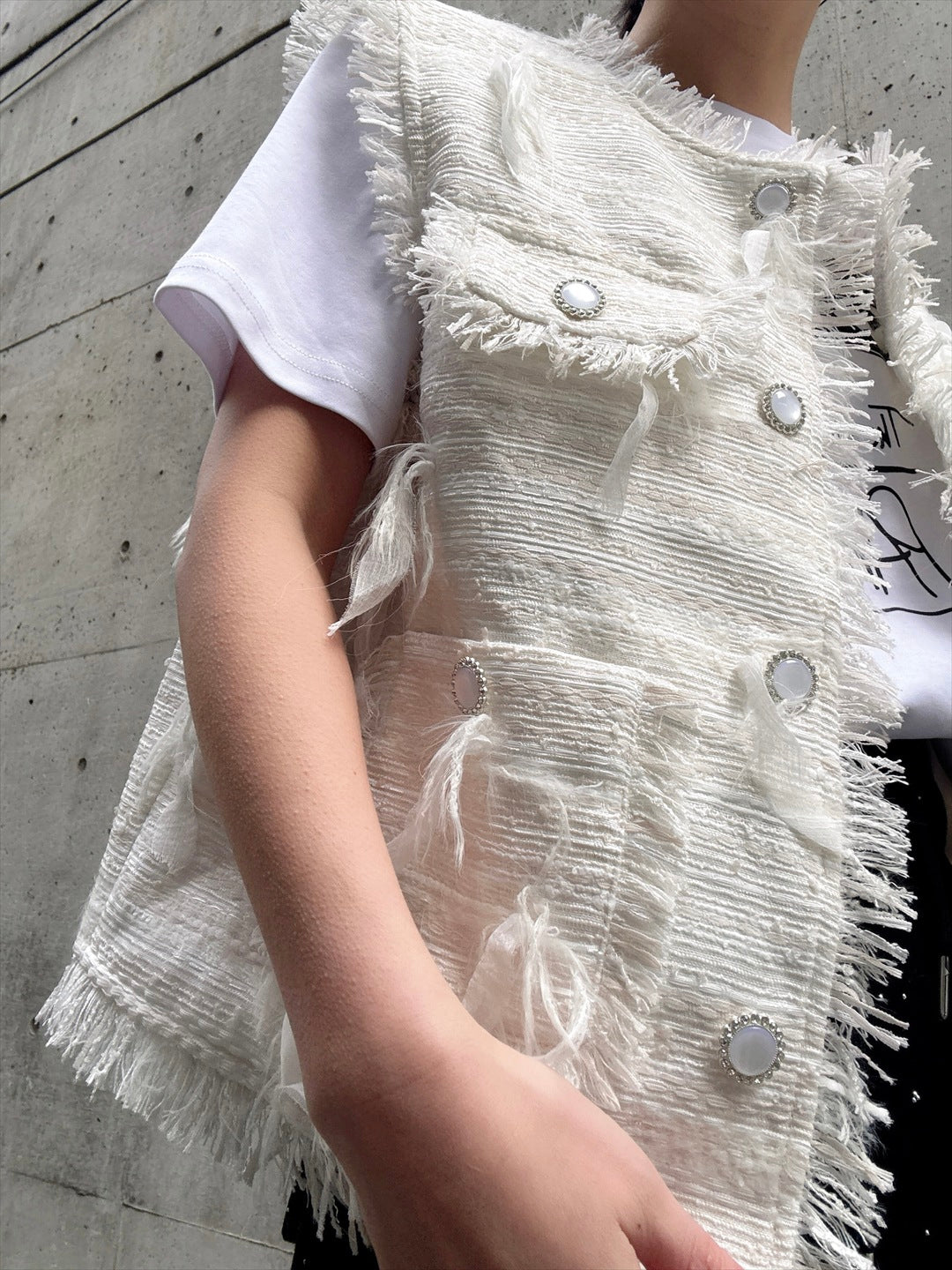feather tweed vest