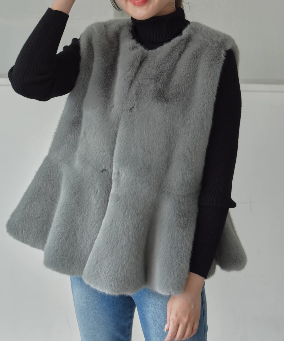 peplum fur vest