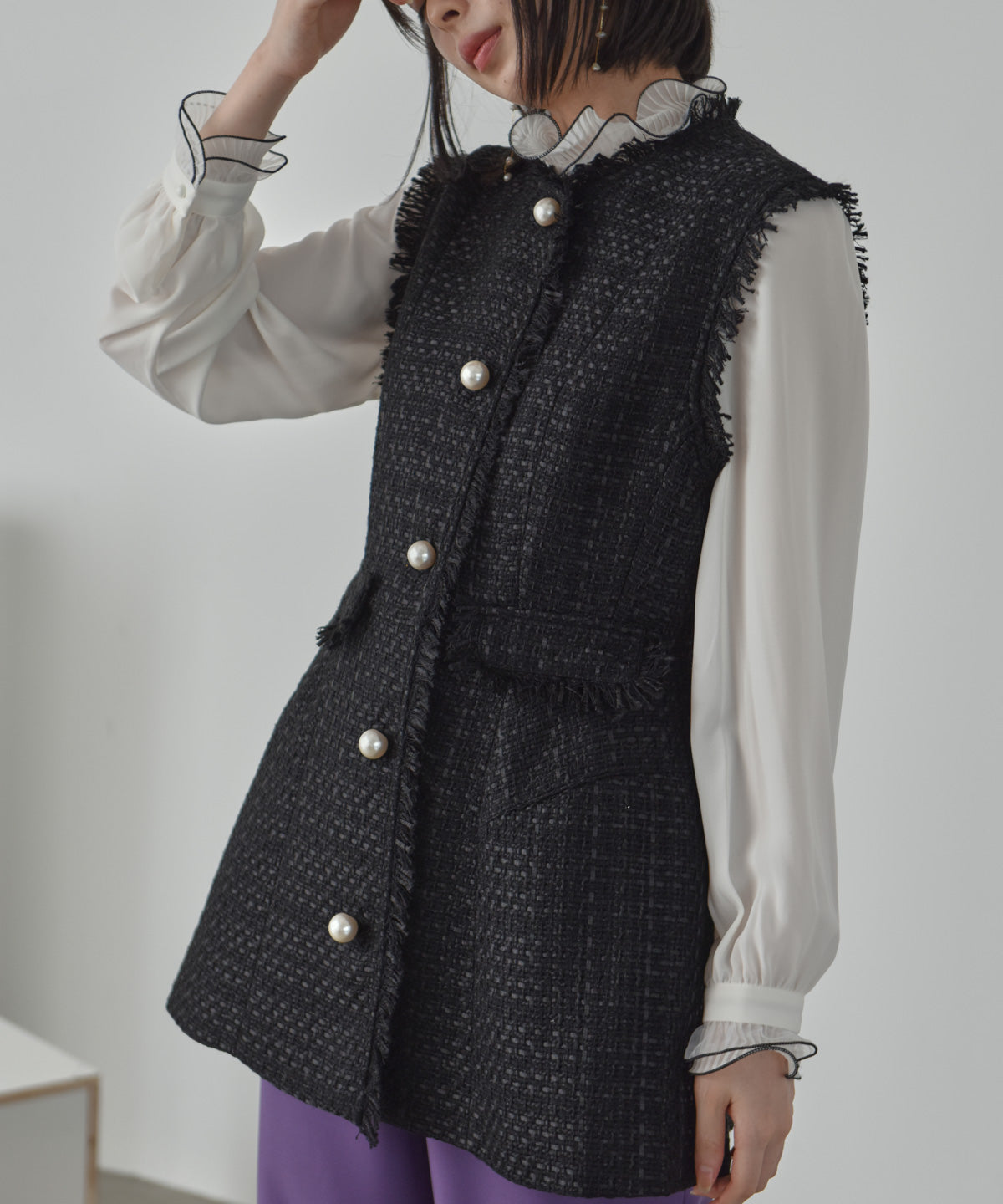 Pearl button tweed gilet