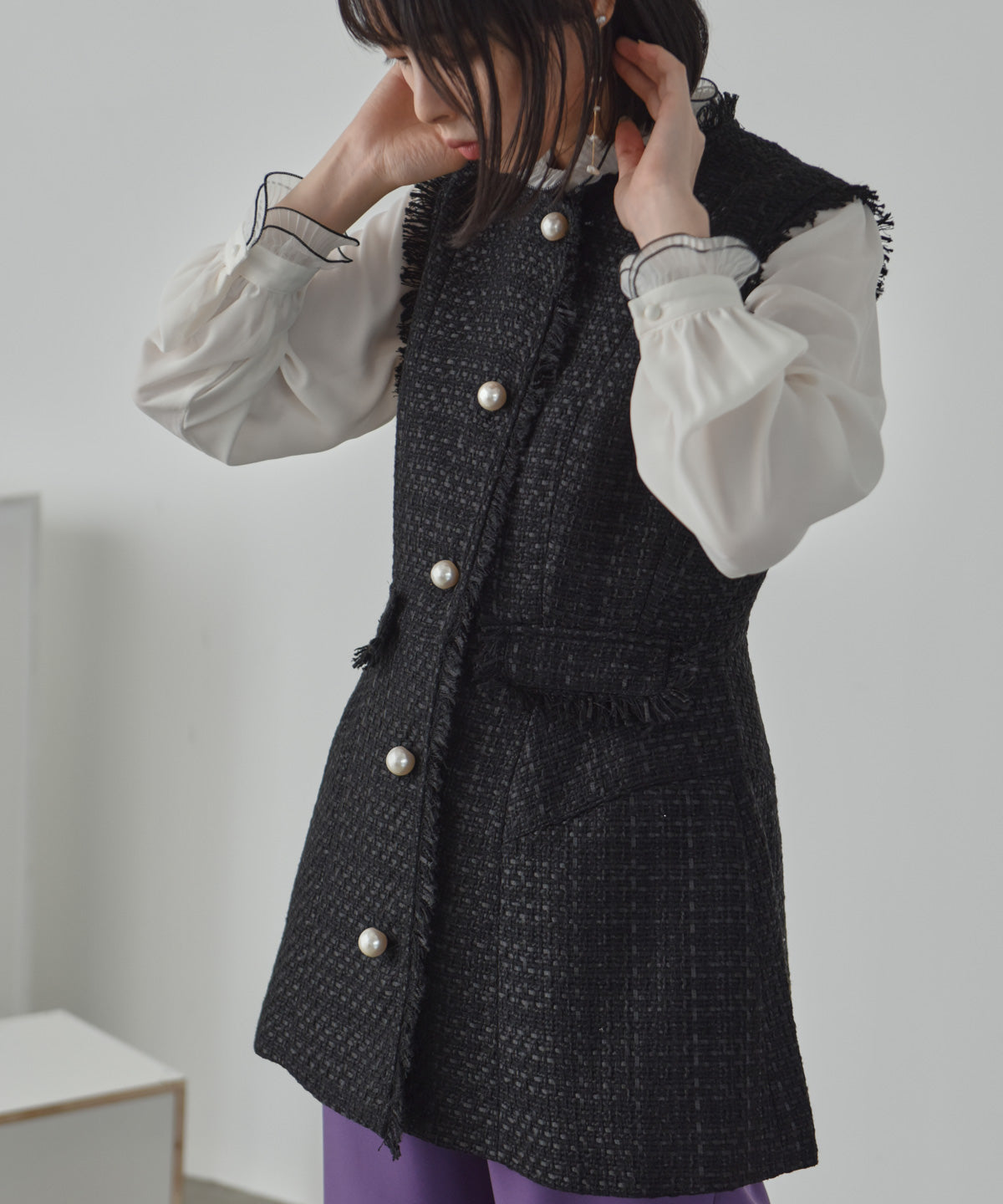 Pearl button tweed gilet