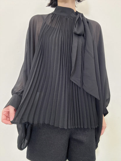 see-through pleated blouse