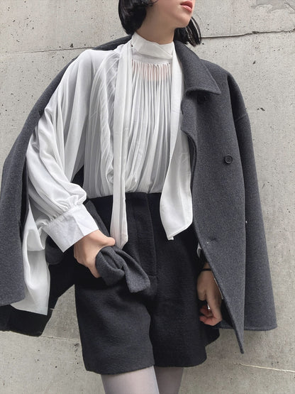 see-through pleated blouse