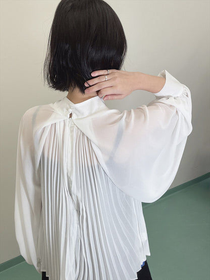 see-through pleated blouse