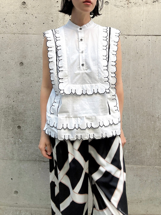 nosleeve frilled yoke blouse