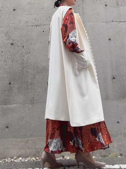 petite scalloped long gilet
